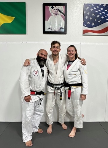Jason with his instructor Chris Burns and his wife Danyelle