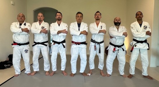 Jason Trudeau with Rickson Gracie, Chris Burns, and fellow black belts